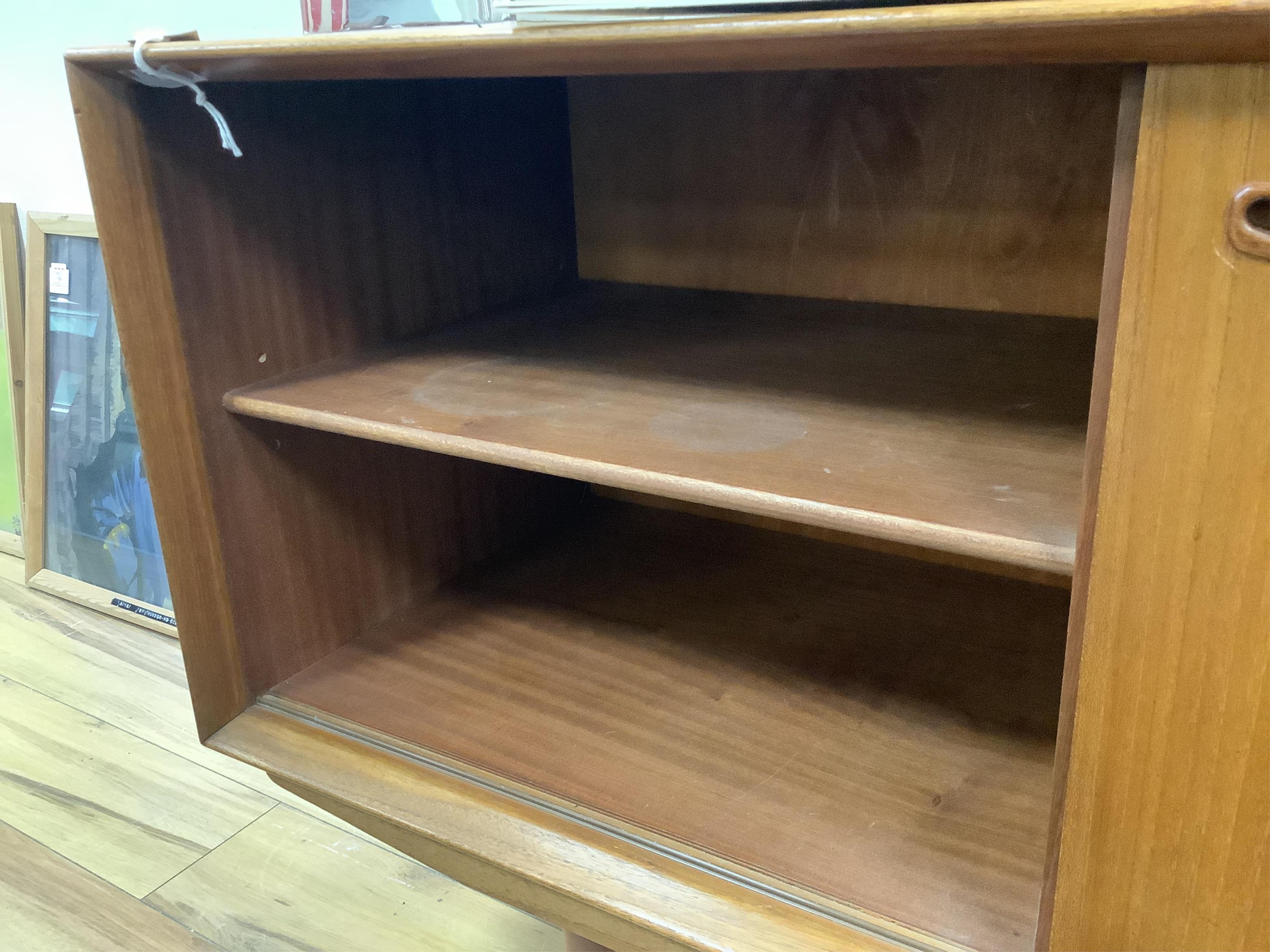 Clausen & Son, a mid century Danish teak sideboard, width 160cm, depth 45cm, height 70cm. Condition - fair